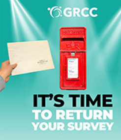 Image of a hand  postbox with the slogan "It's time to return your survey"