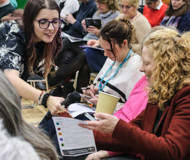 Photo of people at our AI for community event