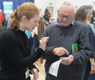 Photo of people at our AI for community event