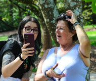 Batsford workshop organiser and participant appreciating a mobile phone photo