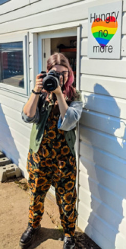 Bo Moon with her camera at Hungry No More