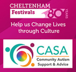 A young woman heating metal in a blacksmith's forge